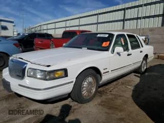✅ 1997 Lincoln Town Car Signature • VIN: 1LNLM82W6VY741808 • Lot: 75015464. Listed on Copart with Not provided. Free auction sales archive from the USA and detailed vehicle history report at DreamBid. Image 1.