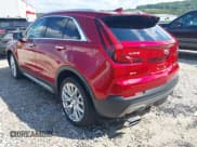 ✅ 2022 Cadillac XT4 AWD Premium Luxury • VIN: 1GYFZDR49NF142231 • Lot: 43358654. Wystawiony na IAAI z przebiegiem 23 965 mil. Bezpłatny archiwum sprzedaży aukcyjnych z USA i szczegółowy raport historii pojazdu na DreamBid. Zdjęcie 3.