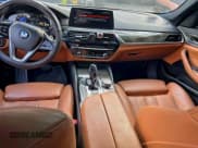 ✅ 2018 BMW 5 Series 530i • VIN: WBAJA5C5XJWA56967 • Лот: 95072665. Опубликован ранее на Copart с пробегом 131 824 миль. Бесплатный доступ к архиву аукционных продаж из США и подробный отчёт об истории автомобиля на DreamBid. Изображение 9.