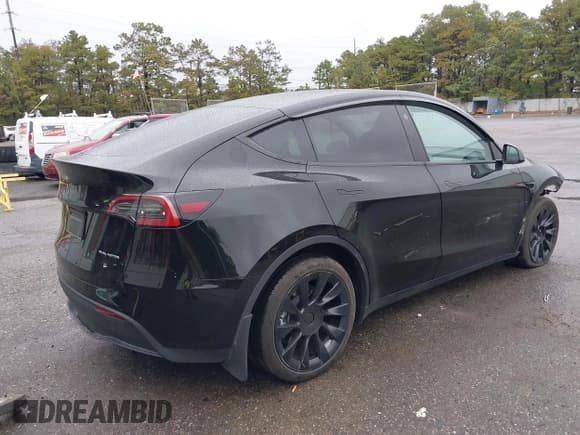 ✅ 2023 Tesla Model Y Long Range • VIN: 7SAYGDEE4PA178113 • Lot: 43376502. Listed on IAAI with 29,060 mi. Free auction sales archive from the USA and detailed vehicle history report at DreamBid. Image 4.