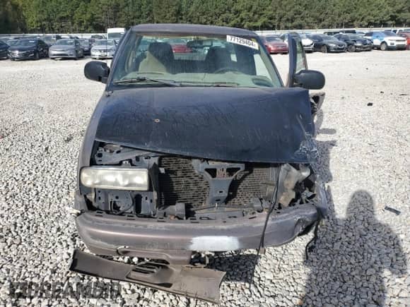 1999 Chevrolet S-10 LS с VIN 1GCCS19X7XK189242, выставлен на аукционе Copart как лот 77129404 с пробегом 208 281 миль миль и Списание • Salvage title. История ставок и продаж доступна на DreamBid. Изображение 5.