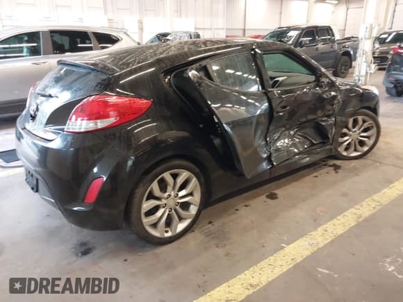 ✅ 2012 Hyundai Veloster w/Gray Int • VIN: KMHTC6ADXCU057467 • Lot: 41217184. Wystawiony na IAAI z przebiegiem 194 602 mil. Bezpłatny archiwum sprzedaży aukcyjnych z USA i szczegółowy raport historii pojazdu na DreamBid. Zdjęcie 4.