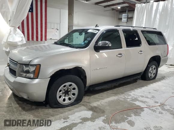 ✅ 2009 Chevrolet Suburban LS • VIN: 1GNFC16089R249869 • Лот: 81688434. Опубликован ранее на Copart с пробегом 174 768 миль. Бесплатный доступ к архиву аукционных продаж из США и подробный отчёт об истории автомобиля на DreamBid. Изображение 1.
