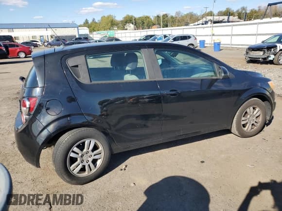 ✅ 2012 Chevrolet Sonic LS • VIN: 1G1JB6SH5C4213911 • Lot: 82407995. Listed on Copart with 214,419 mi. Free auction sales archive from the USA and detailed vehicle history report at DreamBid. Image 3.
