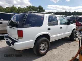2003 Chevrolet Blazer LS z VIN 1GNDT13X13K179026, wystawiony jako Copart lot #71979684 z przebiegiem 213 519 mil mil oraz Szkoda całkowita • Salvage title. Historia ofert i sprzedaży dostępna na DreamBid. Obrazek 3.