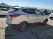 2014 Hyundai Tucson SE z VIN KM8JU3AG1EU824431, wystawiony jako Copart lot #82543985 z przebiegiem 124 792 mil mil oraz Czysty tytuł • Clean title. Historia ofert i sprzedaży dostępna na DreamBid. Obrazek 3.