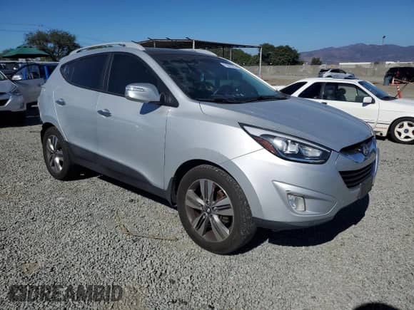 2014 Hyundai Tucson SE z VIN KM8JUCAG7EU843064, wystawiony jako Copart lot #71027575 z przebiegiem 178 099 mil mil oraz Szkoda całkowita • Salvage title. Historia ofert i sprzedaży dostępna na DreamBid. Obrazek 4.