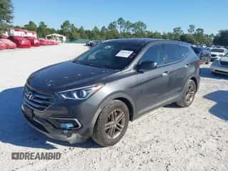 2017 Hyundai Santa Fe 2.4L z VIN 5XYZTDLB1HG468229, wystawiony jako IAAI lot #43426246 z przebiegiem 282 283 mil mil oraz . Historia ofert i sprzedaży dostępna na DreamBid. Obrazek 2.