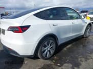 ✅ 2021 Tesla Model Y Standard Range • VIN: 5YJYGDED0MF103010 • Lot: 43613955. Wystawiony na IAAI z przebiegiem 29 356 mil. Bezpłatny archiwum sprzedaży aukcyjnych z USA i szczegółowy raport historii pojazdu na DreamBid. Zdjęcie 4.