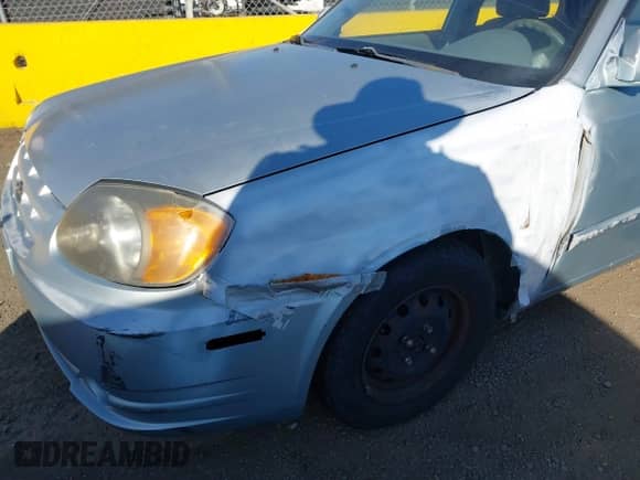 2004 Hyundai Accent GL with VIN KMHCG45C14U547954, listed as a IAAI auction lot 41350219 with 138,436 mi miles and . Bid and sale history available at DreamBid. Image 11.