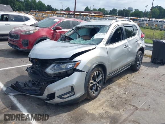 ✅ 2017 Nissan Rogue SL • VIN: JN8AT2MT1HW403414 • Lot: 42752423. Listed on IAAI with 113,683 mi. Free auction sales archive from the USA and detailed vehicle history report at DreamBid. Image 18.