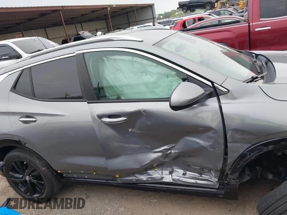 ✅ 2024 Buick Encore GX Sport Touring • VIN: KL4AMESL2RB007976 • Lot: 42082124. Listed on IAAI with 23,170 mi. Free auction sales archive from the USA and detailed vehicle history report at DreamBid. Image 14.