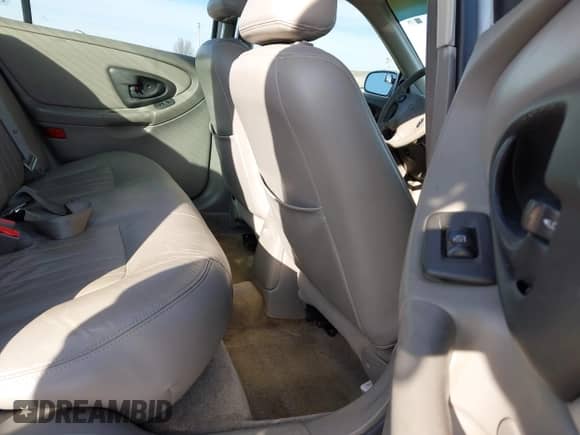 2001 Chevrolet Malibu LS z VIN 1G1NE52J216211458, wystawiony jako IAAI lot #41463419 z przebiegiem 177 790 mil mil oraz . Historia ofert i sprzedaży dostępna na DreamBid. Obrazek 8.