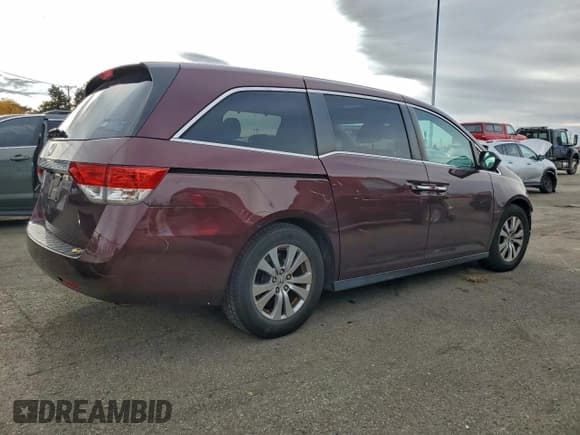 ✅ 2014 Honda Odyssey EX-L • VIN: 5FNRL5H64EB077967 • Lot: 94252755. Listed on Copart with 175,051 mi. Free auction sales archive from the USA and detailed vehicle history report at DreamBid. Image 3.