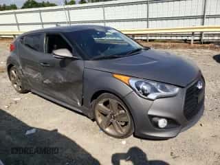 2015 Hyundai Veloster Turbo z VIN KMHTC6AE4FU221955, wystawiony jako Copart lot #68837093 z przebiegiem 103 482 mil mil oraz . Historia ofert i sprzedaży dostępna na DreamBid. Obrazek 4.