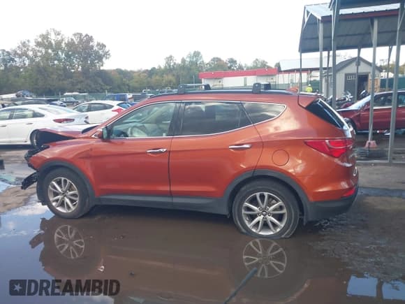 ✅ 2015 Hyundai Santa Fe • VIN: 5XYZUDLA5FG251381 • Лот: 43521645. Опубликован ранее на IAAI с пробегом 119 255 миль. Бесплатный доступ к архиву аукционных продаж из США и подробный отчёт об истории автомобиля на DreamBid. Изображение 15.