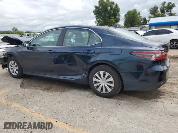 2021 Toyota Camry Hybrid LE with VIN 4T1C31AK9MU562662, listed as a Copart auction lot 70874675 with 197,127 mi miles and Salvage title. Bid and sale history available at DreamBid. Image 2.