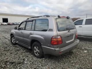 ✅ 2001 Toyota Land Cruiser • VIN: JTEHT05J312013631 • Лот: 90335525. Опубликован ранее на Copart с пробегом 231 419 миль. Бесплатный доступ к архиву аукционных продаж из США и подробный отчёт об истории автомобиля на DreamBid. Изображение 2.