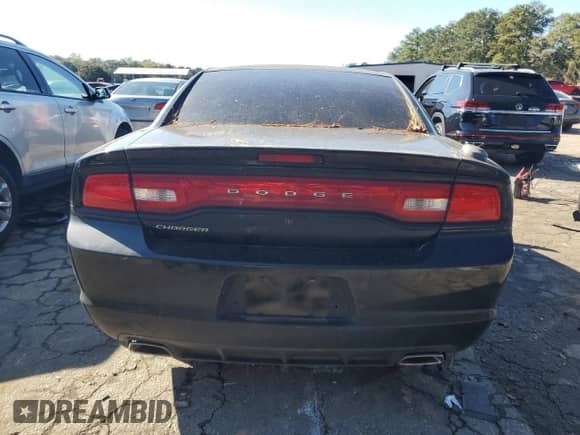 ✅ 2013 Dodge Charger Police • VIN: 2C3CDXAT3DH587898 • Lot: 90938085. Wystawiony na Copart z przebiegiem 193 915 mil. Bezpłatny archiwum sprzedaży aukcyjnych z USA i szczegółowy raport historii pojazdu na DreamBid. Zdjęcie 6.