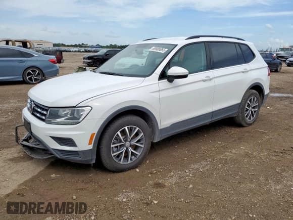 ✅ 2021 Volkswagen Tiguan S • VIN: 3VV1B7AX9MM021629 • Лот: 69080865. Опубликован ранее на Copart с пробегом 64 079 миль. Бесплатный доступ к архиву аукционных продаж из США и подробный отчёт об истории автомобиля на DreamBid. Изображение 1.