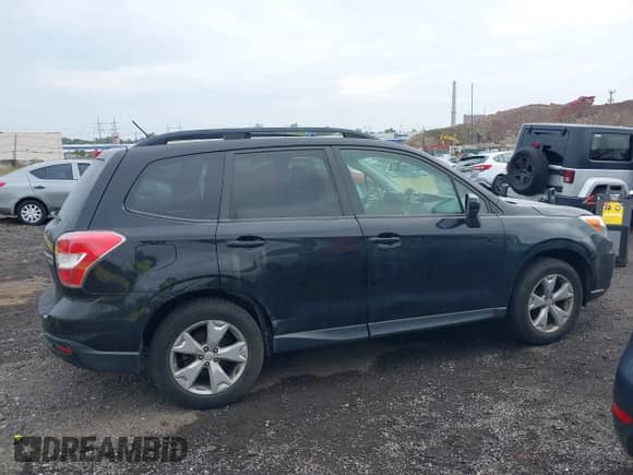 2015 Subaru Forester Premium with VIN JF2SJADCXFG543826, listed as a IAAI auction lot 43306662 with 165,478 mi miles and . Bid and sale history available at DreamBid. Image 13.