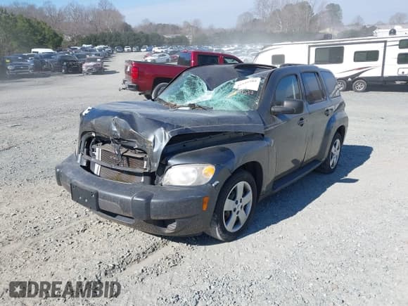 ✅ 2010 Chevrolet HHR LS • VIN: 3GNBAADB5AS579785 • Lot: 41546585. Listed on IAAI with Not provided. Free auction sales archive from the USA and detailed vehicle history report at DreamBid. Image 2.