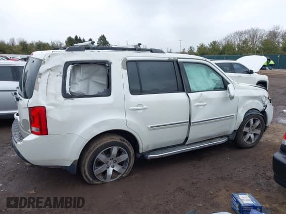 ✅ 2013 Honda Pilot Touring • VIN: 5FNYF3H90DB023520 • Lot: 41730566. Wystawiony na IAAI z przebiegiem 130 108 mil. Bezpłatny archiwum sprzedaży aukcyjnych z USA i szczegółowy raport historii pojazdu na DreamBid. Zdjęcie 14.