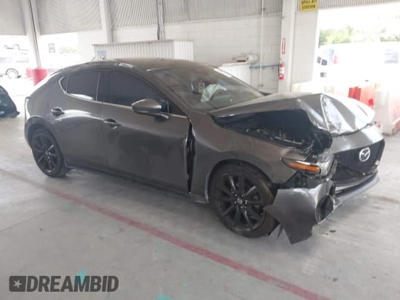 ✅ 2021 Mazda 3 Premium • VIN: JM1BPAML3M1310609 • Лот: 43219103. Опубликован ранее на IAAI с пробегом 56 157 миль. Бесплатный доступ к архиву аукционных продаж из США и подробный отчёт об истории автомобиля на DreamBid. Изображение 1.