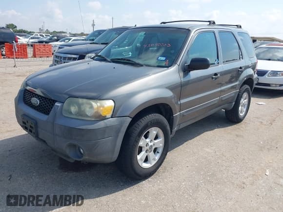 ✅ 2005 Ford Escape XLT • VIN: 1FMCU03135DA08059 • Lot: 43090703. Listed on IAAI with 198,890 mi. Free auction sales archive from the USA and detailed vehicle history report at DreamBid. Image 2.
