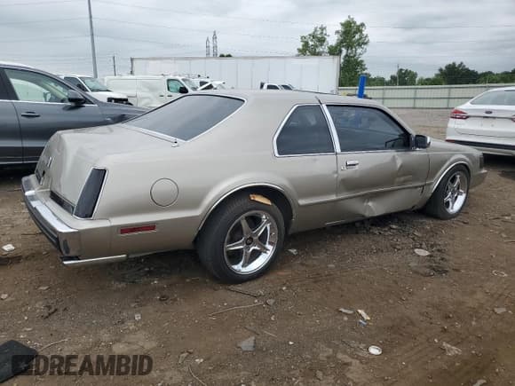 ✅ 1988 Lincoln Mark VIII • VIN: 1LNBM93E0JY624288 • Лот: 63301595. Опубликован ранее на Copart с пробегом 54 015 миль. Бесплатный доступ к архиву аукционных продаж из США и подробный отчёт об истории автомобиля на DreamBid. Изображение 3.