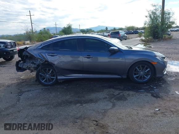 ✅ 2019 Honda Civic EX-L • VIN: JHMFC1F7XKX009910 • Lot: 43264419. Listed on IAAI with 132,815 mi. Free auction sales archive from the USA and detailed vehicle history report at DreamBid. Image 13.