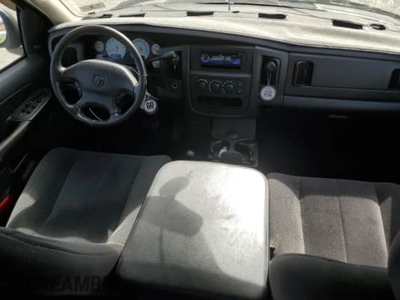 2003 Dodge 1500 ST z VIN 1D7HU18D73S243601, wystawiony jako Copart lot #74584294 z przebiegiem 153 791 mil mil oraz Szkoda całkowita • Salvage title. Historia ofert i sprzedaży dostępna na DreamBid. Obrazek 8.