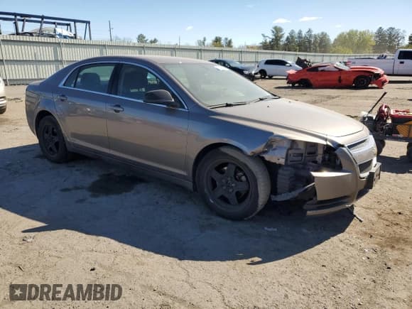 ✅ 2010 Chevrolet Malibu 1LS • VIN: 1G1ZB5EB4A4134988 • Lot: 75615554. Listed on Copart with 74,294 mi. Free auction sales archive from the USA and detailed vehicle history report at DreamBid. Image 4.