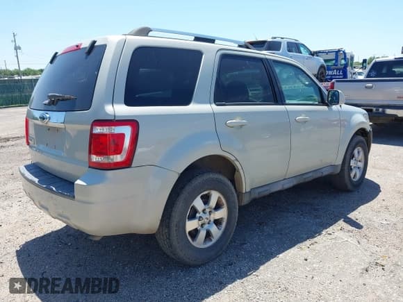 ✅ 2009 Ford Escape Limited • VIN: 1FMCU04G79KB35059 • Lot: 42302842. Listed on IAAI with 248,440 mi. Free auction sales archive from the USA and detailed vehicle history report at DreamBid. Image 4.