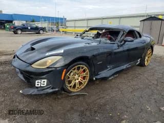 ✅ 2013 Dodge Viper GTS • VIN: 1C3ADEBZ5DV400182 • Lot: 67473325. Listed on Copart with 95,533 mi. Free auction sales archive from the USA and detailed vehicle history report at DreamBid. Image 1.