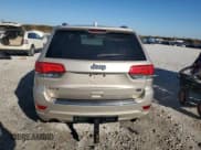 ✅ 2014 Jeep Grand Cherokee Overland • VIN: 1C4RJFCT9EC147999 • Lot: 89689645. Listed on Copart with 133,640 mi. Free auction sales archive from the USA and detailed vehicle history report at DreamBid. Image 6.