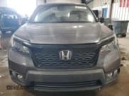 ✅ 2021 Honda Passport EX-L • VIN: 5FNYF8H58MB015661 • Lot: 84723405. Wystawiony na Copart z przebiegiem 53 315 mil. Bezpłatny archiwum sprzedaży aukcyjnych z USA i szczegółowy raport historii pojazdu na DreamBid. Zdjęcie 5.