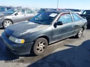 ✅ 1997 Nissan 200SX • VIN: 1N4AB42D3VC511607 • Lot: 43563213. Listed on IAAI with 176,739 mi. Free auction sales archive from the USA and detailed vehicle history report at DreamBid. Image 2.