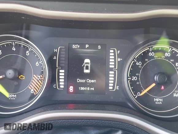 ✅ 2015 Jeep Cherokee Latitude • VIN: 1C4PJMCS6FW528292 • Lot: 43561483. Listed on IAAI with 136,416 mi. Free auction sales archive from the USA and detailed vehicle history report at DreamBid. Image 7.