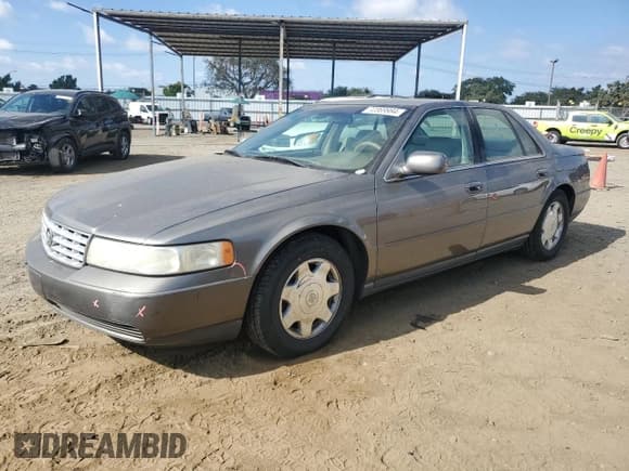 ✅ 1998 Cadillac Seville SLS • VIN: 1G6KS54YXWU931108 • Lot: 72369984. Wystawiony na Copart z przebiegiem 103 267 mil. Bezpłatny archiwum sprzedaży aukcyjnych z USA i szczegółowy raport historii pojazdu na DreamBid. Zdjęcie 1.