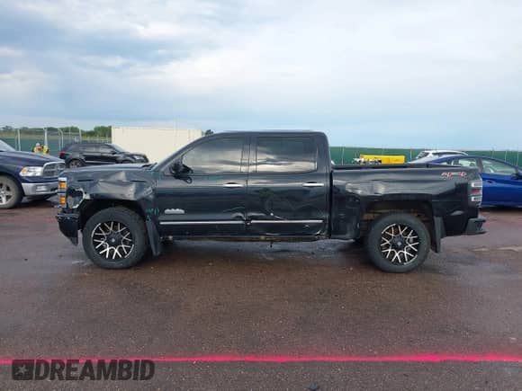 2014 Chevrolet Silverado 1500 High Country with VIN 3GCUKTEC2EG553252, listed as a IAAI auction lot 42898703 with 193,749 mi miles and . Bid and sale history available at DreamBid. Image 14.