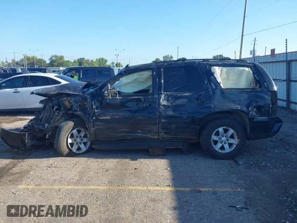 ✅ 2007 GMC Yukon SLT • VIN: 1GKFK13077J140951 • Lot: 42979861. Listed on IAAI with Not provided. Free auction sales archive from the USA and detailed vehicle history report at DreamBid. Image 13.