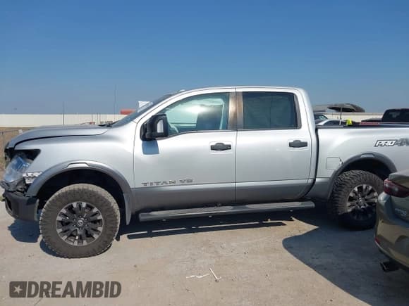 ✅ 2018 Nissan Titan Pro-4X • VIN: 1N6AA1E51JN551695 • Lot: 43365881. Listed on IAAI with 114,790 mi. Free auction sales archive from the USA and detailed vehicle history report at DreamBid. Image 15.