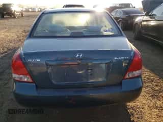 2003 Hyundai Elantra GLS z VIN KMHDN45D83U598594, wystawiony jako Copart lot #76713594 z przebiegiem 138 884 mil mil oraz Szkoda całkowita • Salvage title. Historia ofert i sprzedaży dostępna na DreamBid. Obrazek 6.