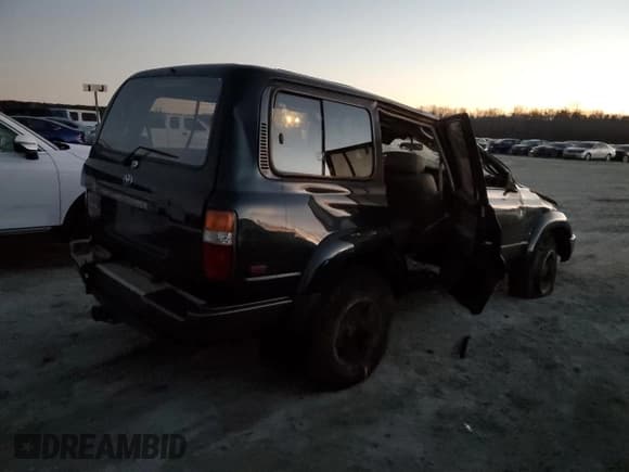 ✅ 1997 Toyota Land Cruiser • VIN: JT3HJ85J1V0161744 • Lot: 86346574. Listed on Copart with 104,904 mi. Free auction sales archive from the USA and detailed vehicle history report at DreamBid. Image 3.