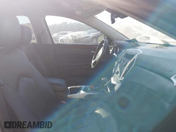 ✅ 2012 Cadillac SRX Premium Collection • VIN: 3GYFNCE34CS511833 • Lot: 43339091. Wystawiony na IAAI z przebiegiem 172 706 mil. Bezpłatny archiwum sprzedaży aukcyjnych z USA i szczegółowy raport historii pojazdu na DreamBid. Zdjęcie 5.