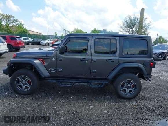 ✅ 2019 Jeep Wrangler Unlimited Sport S • VIN: 1C4HJXDG3KW569389 • Lot: 42197632. Listed on IAAI with 77,058 mi. Free auction sales archive from the USA and detailed vehicle history report at DreamBid. Image 14.