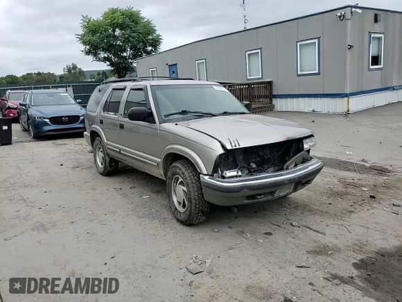 2001 Chevrolet Blazer LT с VIN 1GNDT13W812158646, выставлен на аукционе Copart как лот 73664804 с пробегом 182 735 миль миль и Списание • Salvage title. История ставок и продаж доступна на DreamBid. Изображение 12.