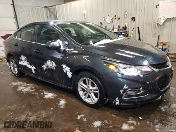 ✅ 2018 Chevrolet Cruze LT • VIN: 1G1BE5SMXJ7149976 • Lot: 42332393. Listed on Copart with 60,362 mi. Free auction sales archive from the USA and detailed vehicle history report at DreamBid. Image 4.
