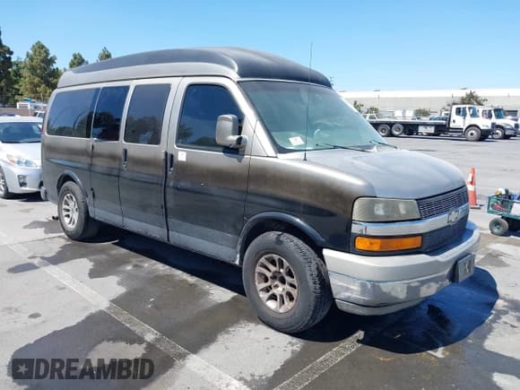 ✅ 2004 Chevrolet Express Passenger • VIN: 1GBFG15T641128908 • Lot: 42729249. Listed on IAAI with 207,057 mi. Free auction sales archive from the USA and detailed vehicle history report at DreamBid. Image 1.